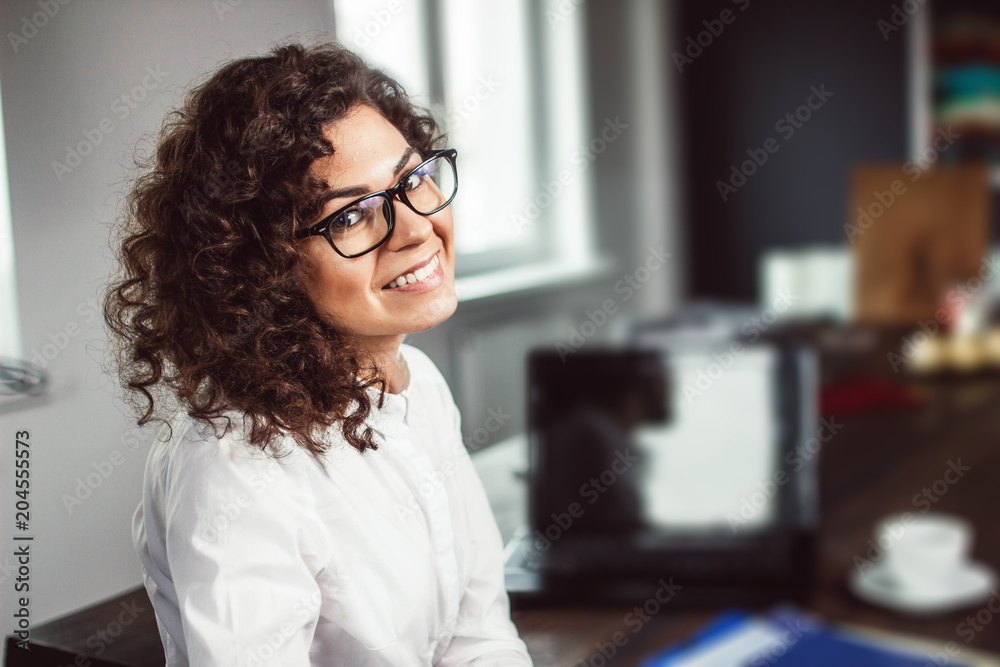 curly business woman boss. workplace leader. curly business woman boss. workplace leader.