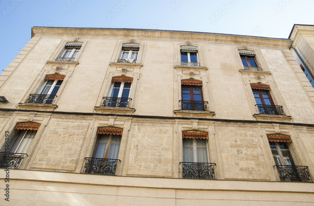 Facade with French balconies.
