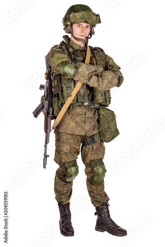 russian special forces soldier with rifle on dark background. army, military and people concept