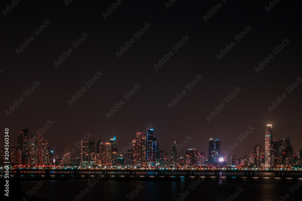 Fototapeta premium modern skyline at night - skyscraper cityscape, Panama City -