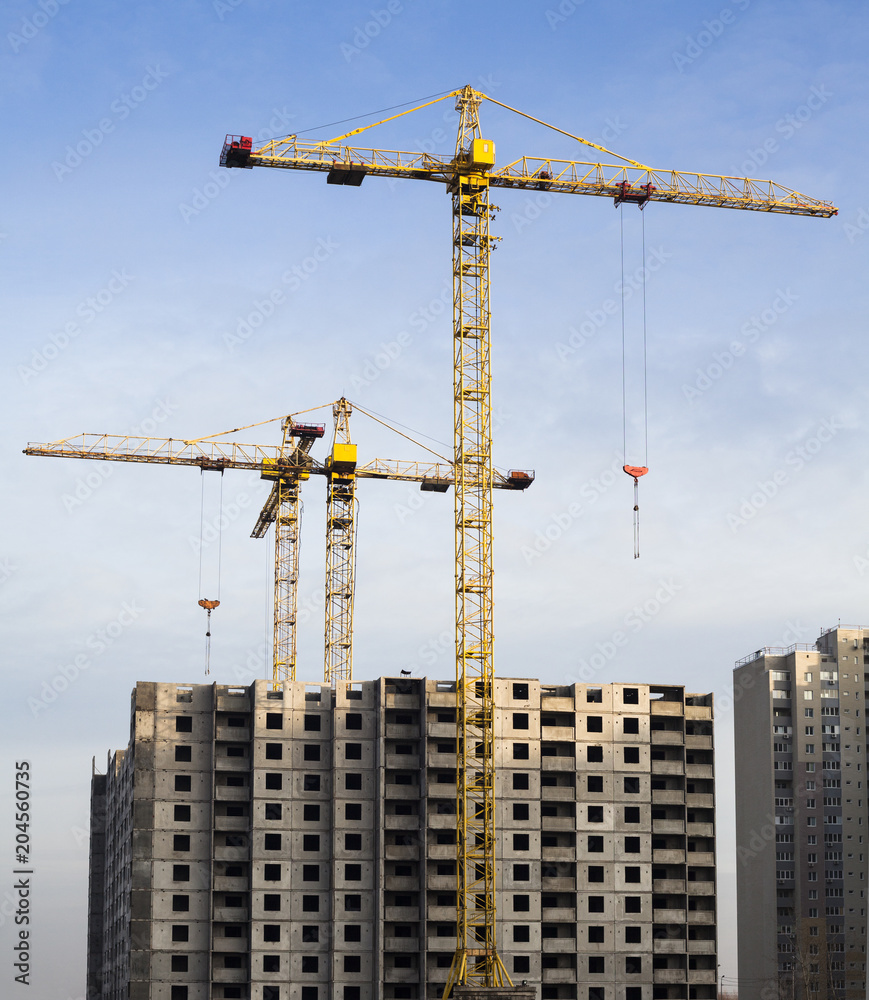 Tower cranes and high-rise building Tower cranes and high-rise building