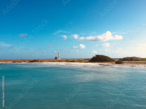 Ocean, coast and lighthouse - beautiful landscape of Klein Curacao Island