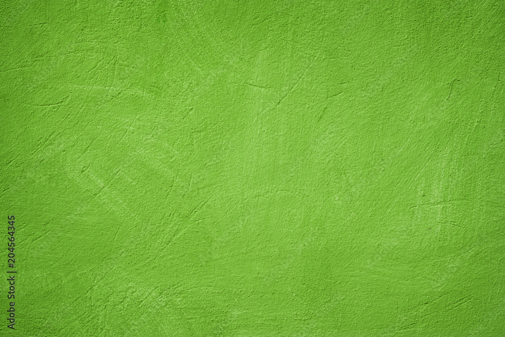 Obraz premium A green colored old wall texture background.