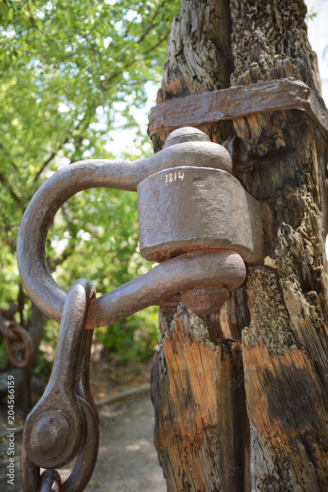 Close-up fastening of old British anchor, Sevastopol, Crimea, Russia. Close-up fastening of old British anchor, Sevastopol, Crimea, Russia.