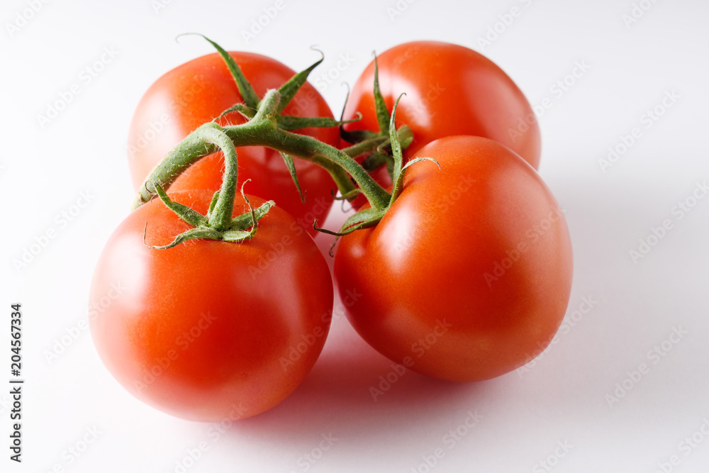 Fresh tomatoes isolated on white background. Fresh tomatoes isolated on white background.