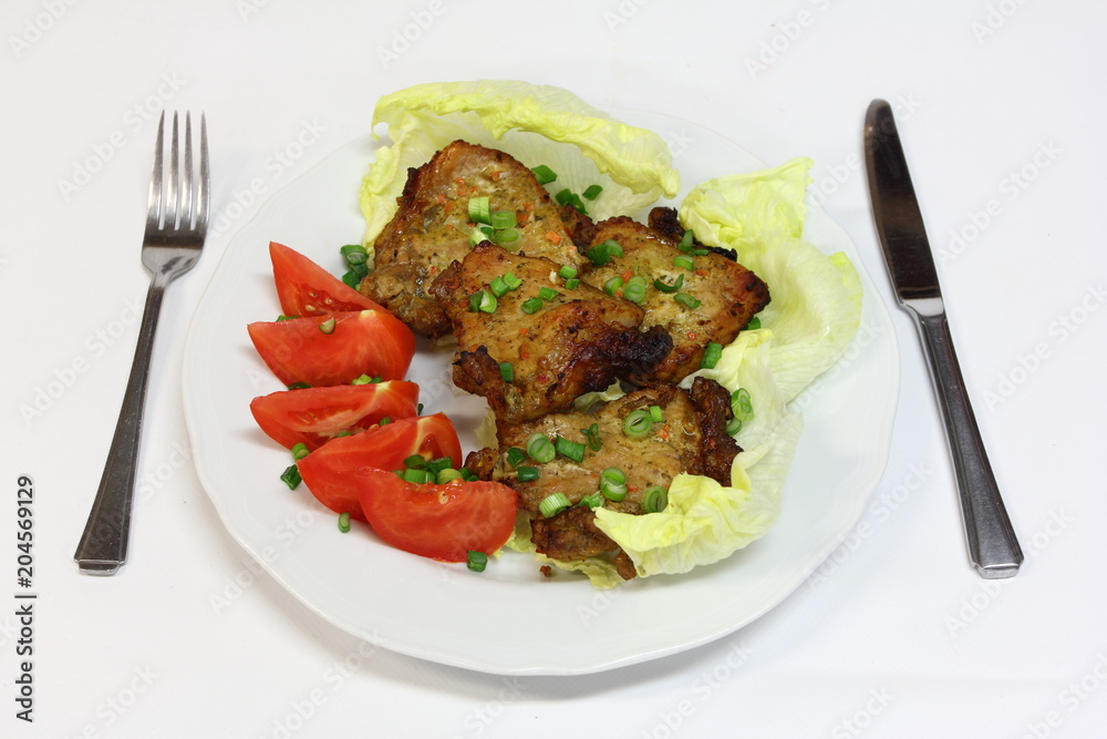 grilled pork chops with tomatoes and lettuce grilled pork chops with tomatoes and lettuce