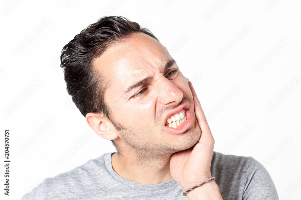 Man with toothache on white background Man with toothache on white background