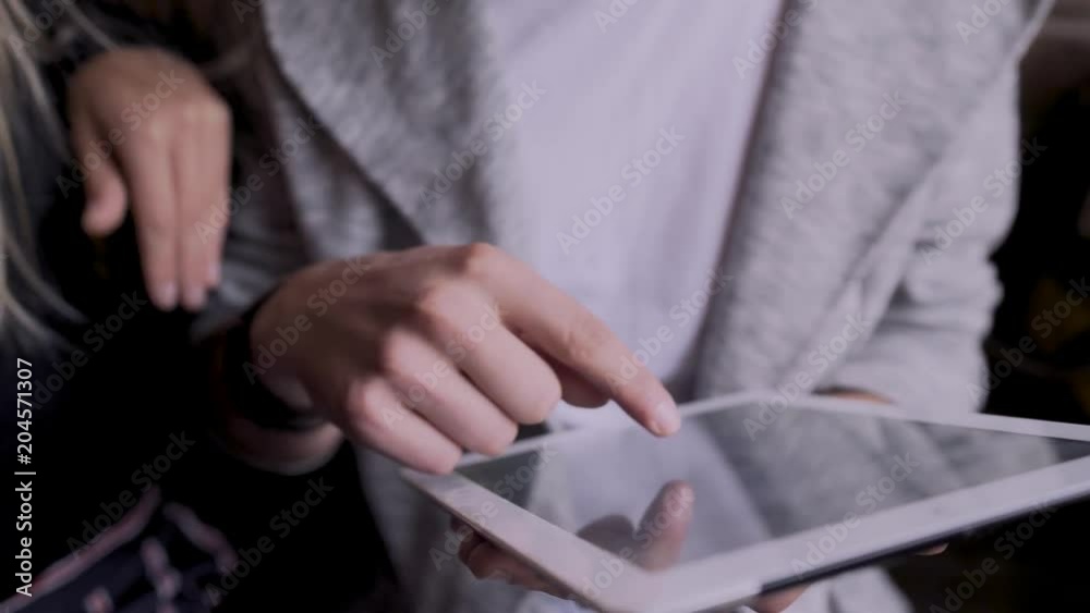 girl with a guy in a cafe found in the tablet something funny girl with a guy in a cafe found in the tablet something funny