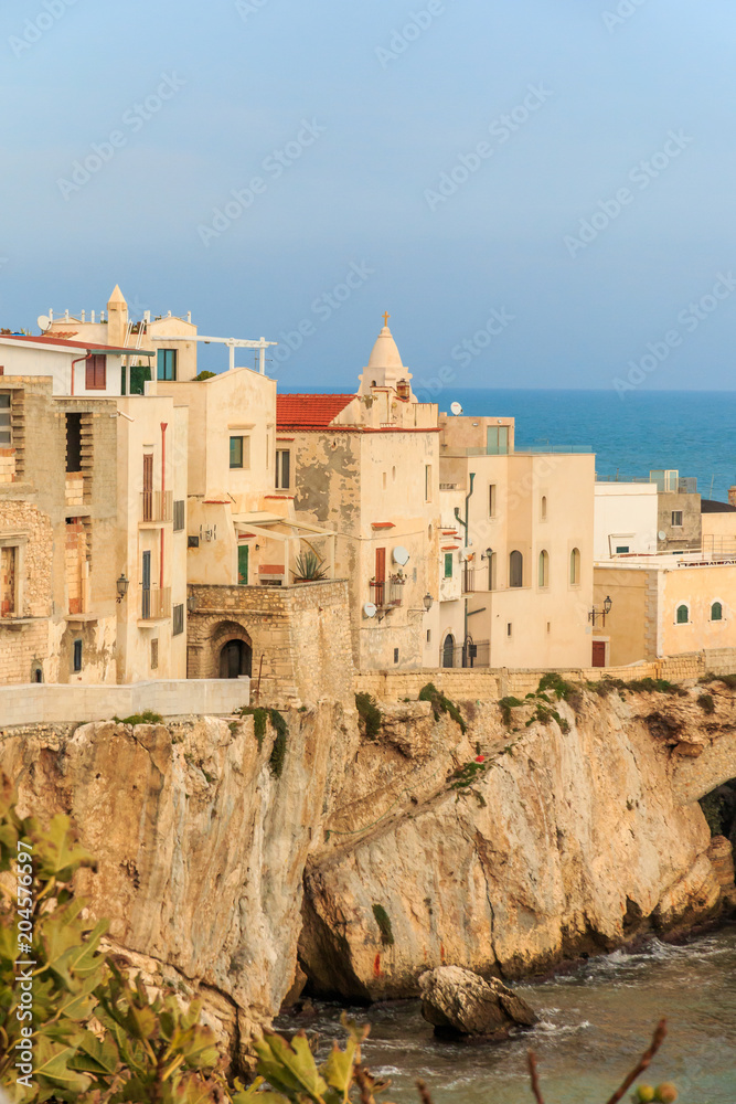 Italy, Foggia, Apulia, SE Italy, Gargano National Park,  Vieste. Old town of Vieste cityscape with medieval church at the tip of the peninsula of this fishing village in Gargano, Apulia, Italy.