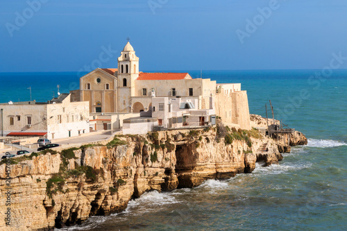 Italy, Foggia, Apulia, SE Italy, Gargano National Park,  Vieste. Old town of Vieste cityscape with medieval church of St. San Francesco at the tip of the peninsula in Gargano, Apulia, Italy. photo