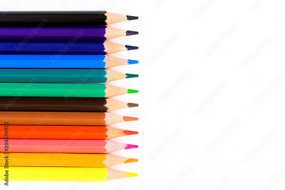 Group of pencils of colors against a white background with space copy Group of pencils of colors against a white background with space copy