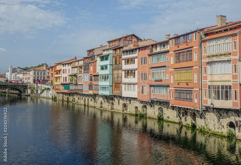 Castres, Midi Pyrenees, France - August 2, 2017: View of the canal that crosses the city of Castres with the old buildings