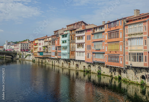 Castres, Midi Pyrenees, France - August 2, 2017: View of the canal that crosses the city of Castres with the old buildings