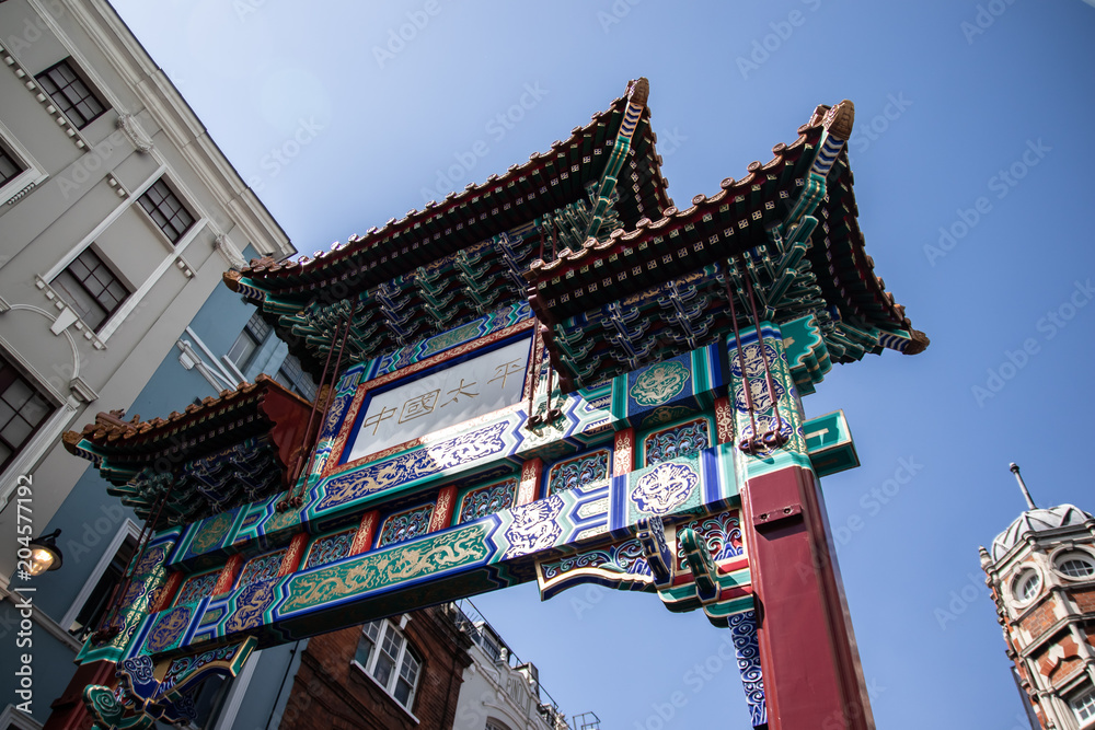 Chinese gate in china town London translates to England eagle Chinese gate in china town London translates to England eagle
