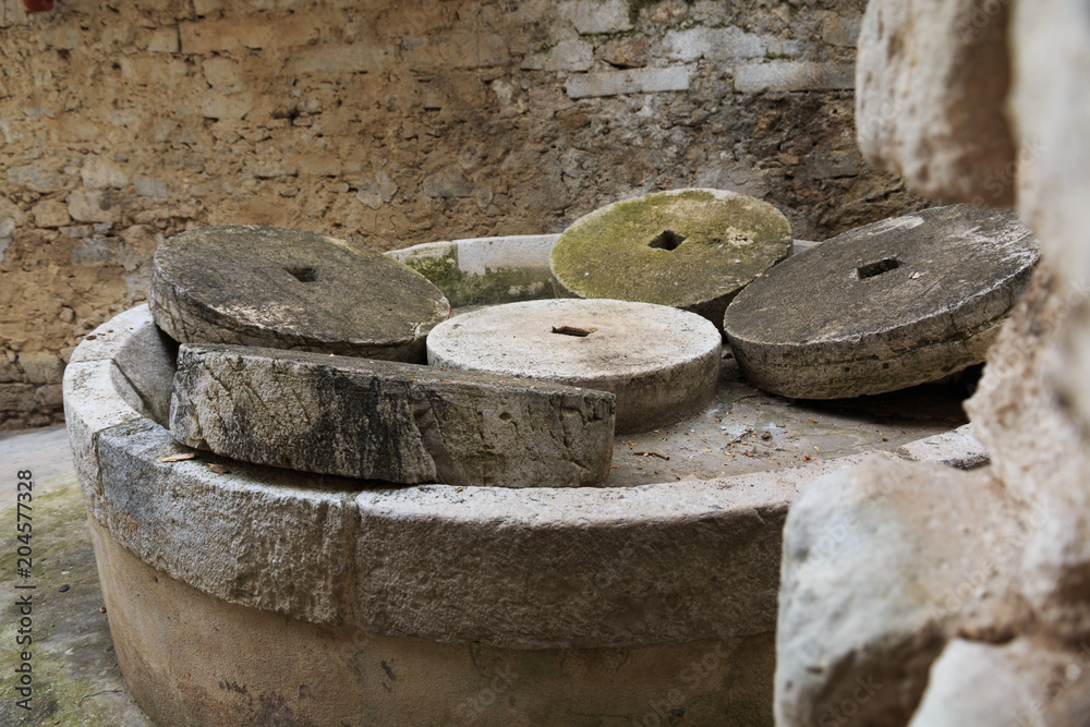 Fototapeta premium Italy, Foggia, Apulia, SE Italy, Gargano National Park,Vieste. Stone grinding wheels.