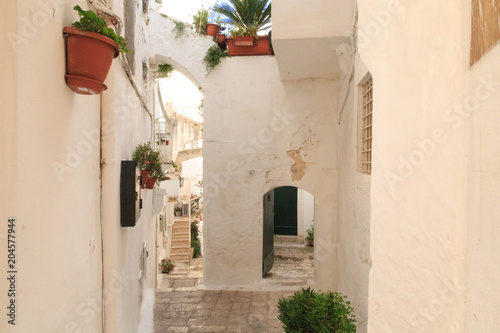 Italy, SE Italy, Ostuni. Old town narrow alleyways, arches. The "White City."