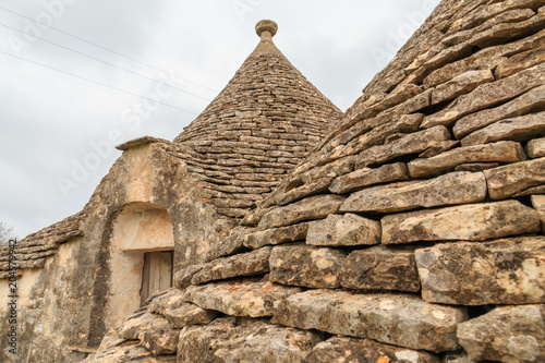 Italy  SE Italy  Region of Apulia  Province of Bari  Itria Valley   Alberobello. A trullo house is a Apulian dry stone hut with a conical roof. UNESCO Heritage site.