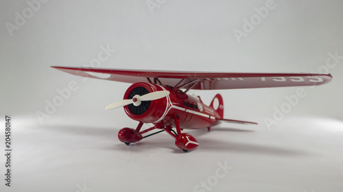 vintage toy plane on an isolated white background