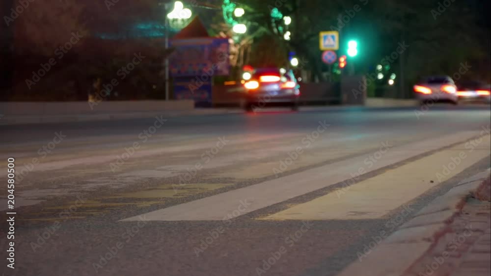 Time lapse view of people and traffic car. Motion blurred light in the city downtown night skyline full moon and people walking on street. Time lapse view of people and traffic car. Motion blurred light in the city downtown night skyline full moon and people walking on street.