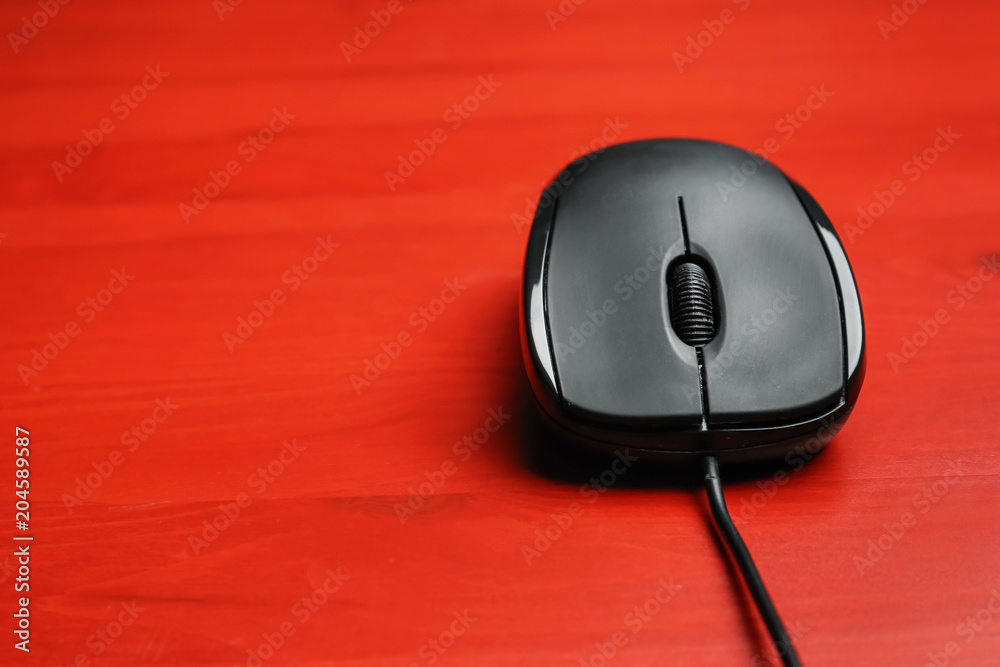Modern computer mouse on color background Modern computer mouse on color background