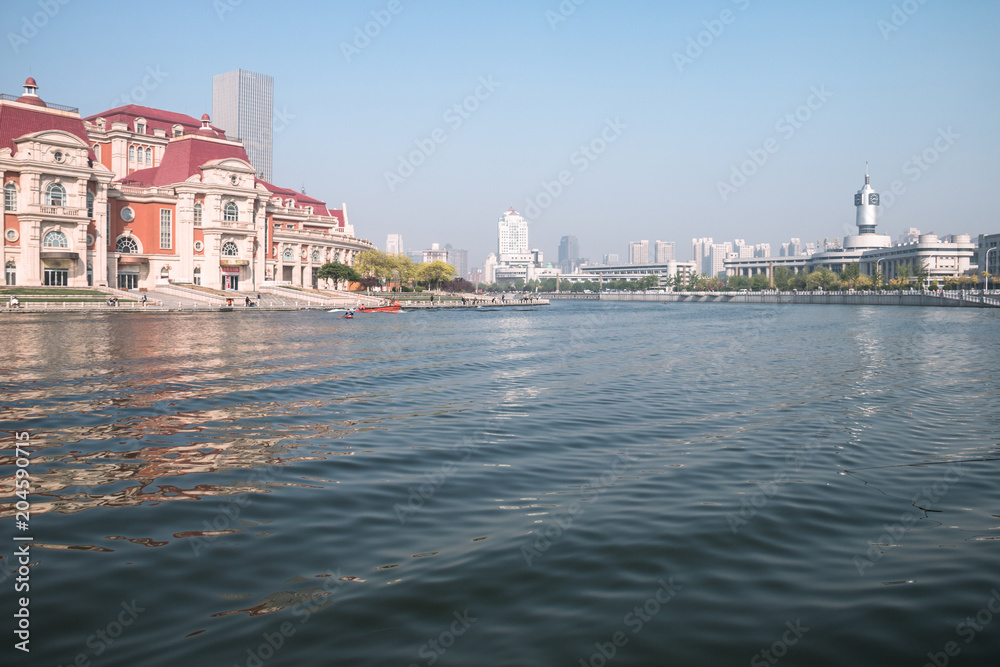 Cityscape of Tianjin, China. The word on the building is: Tianjin Station.