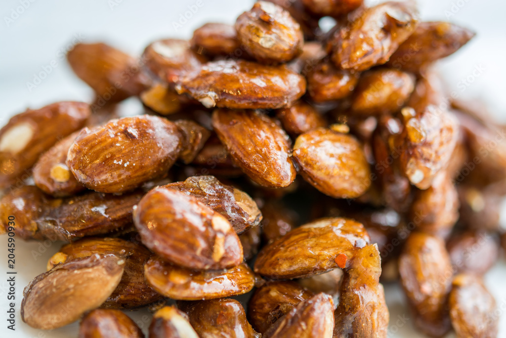 Roasted caramelized almonds with cumin and chili flakes Roasted caramelized almonds with cumin and chili flakes