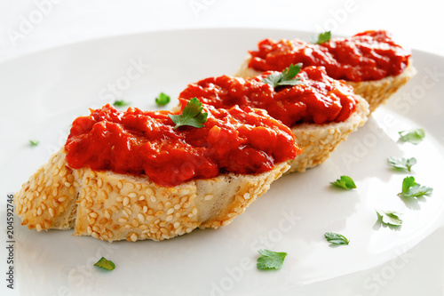 ajvar sandwiches decorated with cilantro