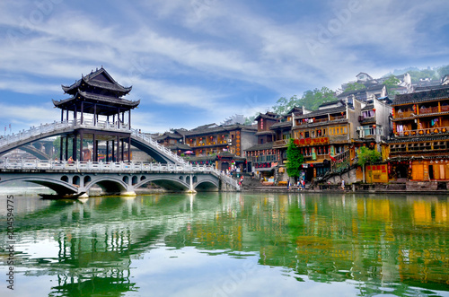 HUNAN, CHINA - JUNE 16, 2014 : Old houses in Fenghuang county in Hunan, China. The ancient town of Fenghuang was added to the UNESCO World Heritage Tentative List in the Cultural category.