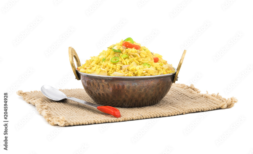 Indian Breakfast Dish Poha Also Know as Pohe or Aalu poha made up of Beaten Rice or Flattened Rice. The rice flakes are lightly fried in oil with mustard, chilly, onion, curry leaves and turmeric Indian Breakfast Dish Poha Also Know as Pohe or Aalu poha made up of Beaten Rice or Flattened Rice. The rice flakes are lightly fried in oil with mustard, chilly, onion, curry leaves and turmeric