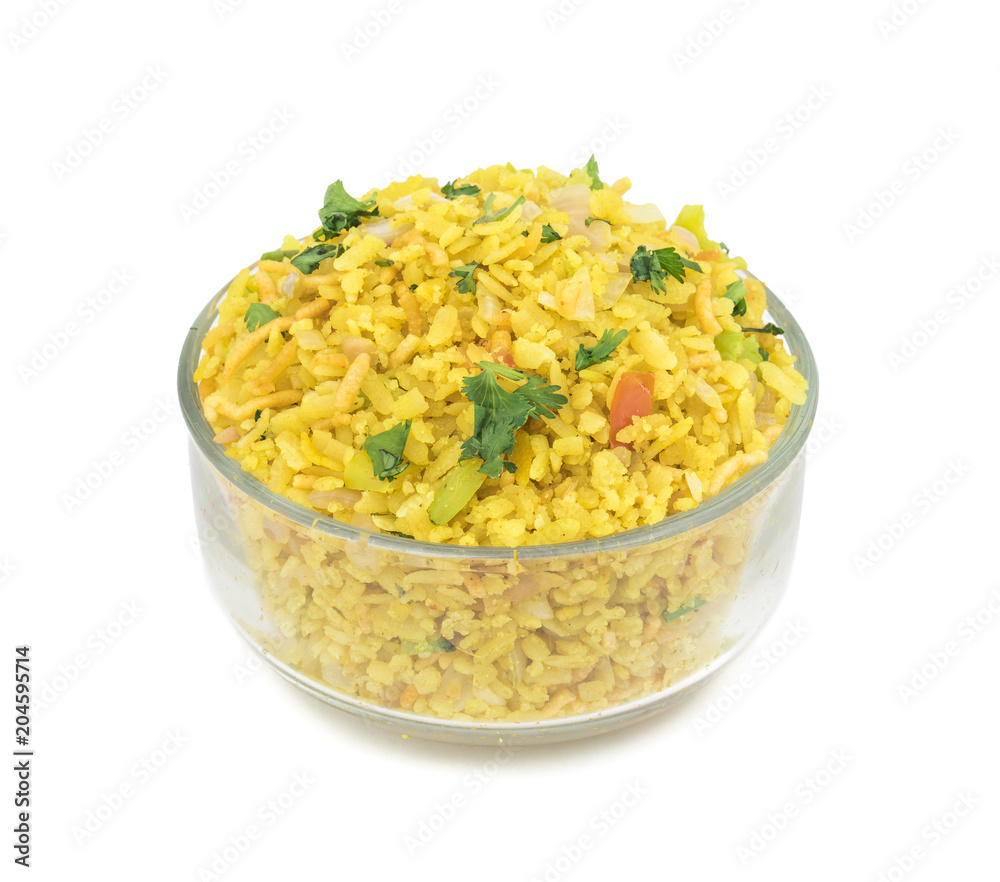 Indian Breakfast Dish Poha Also Know as Pohe or Aalu poha made up of Beaten Rice or Flattened Rice. The rice flakes are lightly fried in oil with mustard, chilly, onion, curry leaves and turmeric