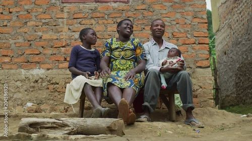 African family sitting on a bench