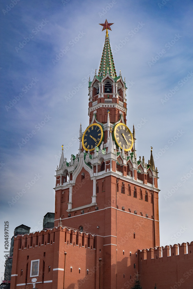 Spasskaya Tower on Red Square, Moscow, Russia with dark blue sky above Spasskaya Tower on Red Square, Moscow, Russia with dark blue sky above