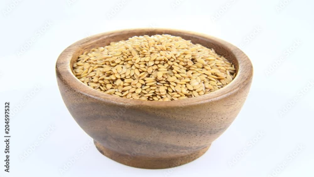 flax seeds in wooden bowl ,rotation
flax seeds in wooden bowl ,rotation