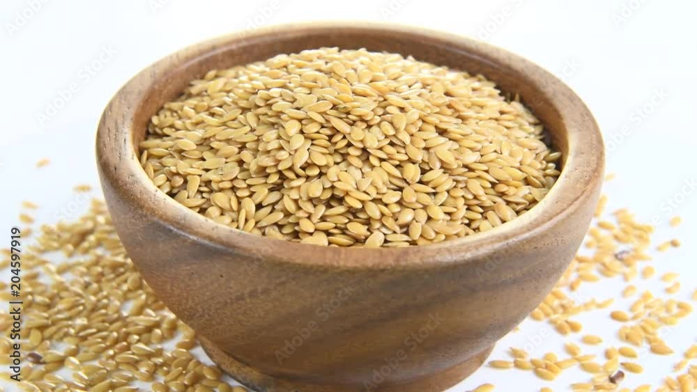 flax seeds in wooden bowl ,rotation
flax seeds in wooden bowl ,rotation