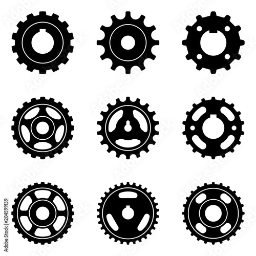 Set of sprocket wheel and pulley. Silhouette vector