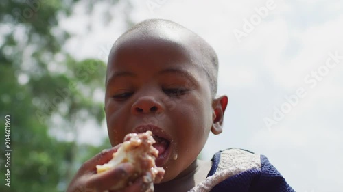 Wallpaper Mural Close up of an African child eating Torontodigital.ca
