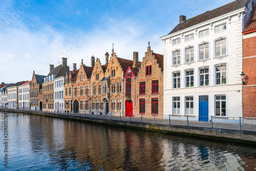 View of a canal and old colorful buildings in Bruges, Belgium