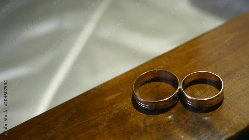 wedding rings on the table, light wedding rings on the table, light