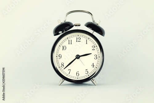 Vintage clock against isolated background