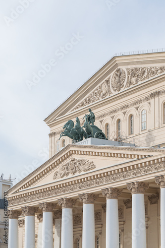 Facade of Bolshoi Theater, Moscow, Russia, beautiful architectural monument with columns and quadriga on the gable, symbol of Russian ballet and cultural landmark