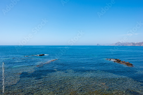 The sea in Calabardina under the blue sky, Murcia photo