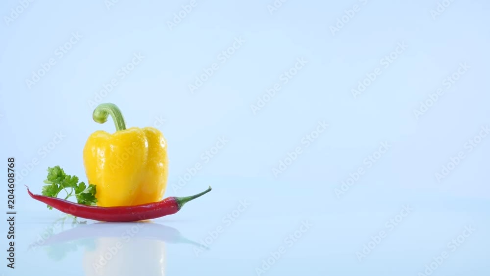 yellow papper and chili, lie on white background
