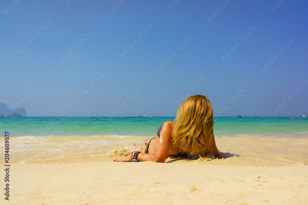 woman resting at the tropical Thailand Railay beach woman resting at the tropical Thailand Railay beach