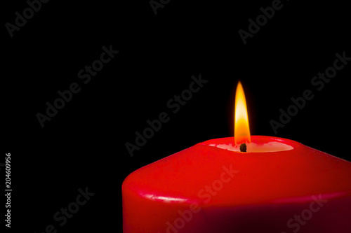 Lit red candle