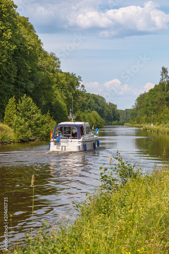 Motorboat in a canal in the summer