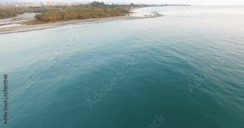 Aerial survey of the mouth of the river Gumista flowing into the sea. photo