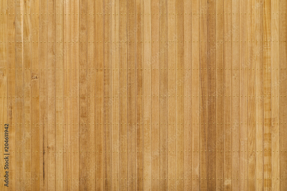 Naklejka premium Teak wood panel with brass nail