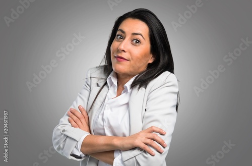 Pretty woman making unimportant gesture on grey background