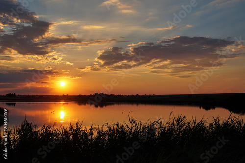 Sunset on the beach with beautiful sky. photo