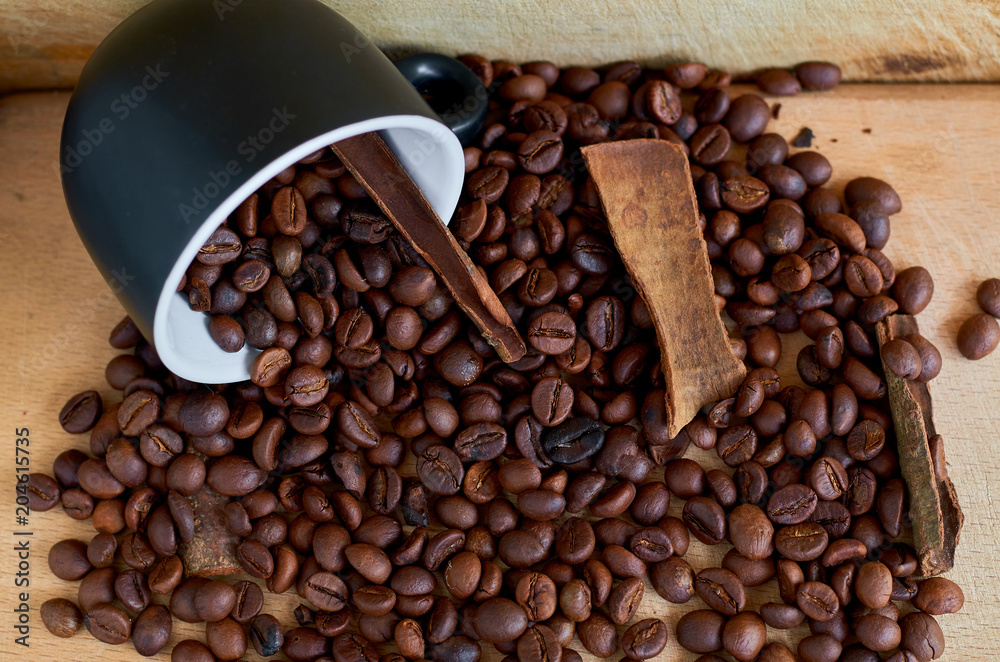 Fototapeta premium coffee beans, black Cup and cinnamon